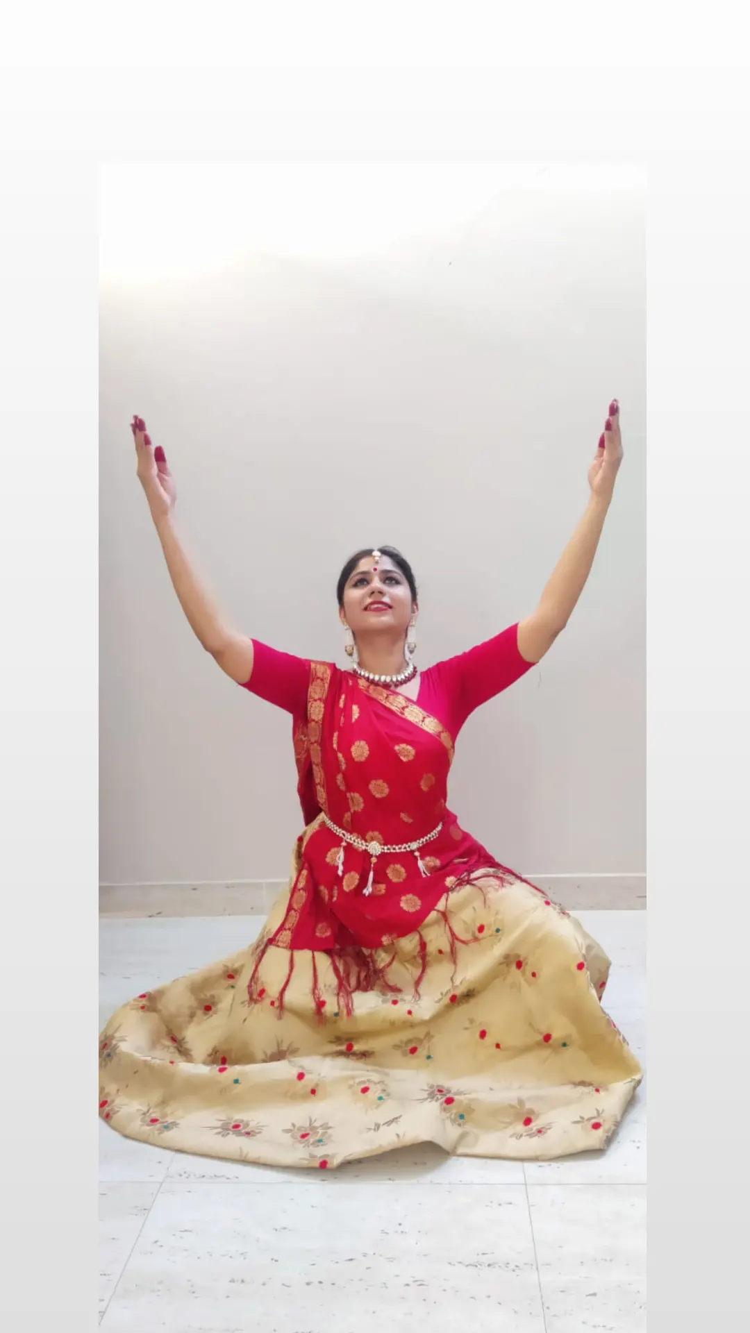 Kathak pose with arms raised